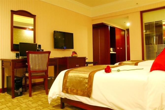 Vienna Hotel Chaoyang Наньнін Номер фото