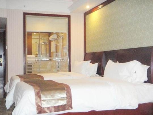 Vienna Hotel Chaoyang Наньнін Номер фото